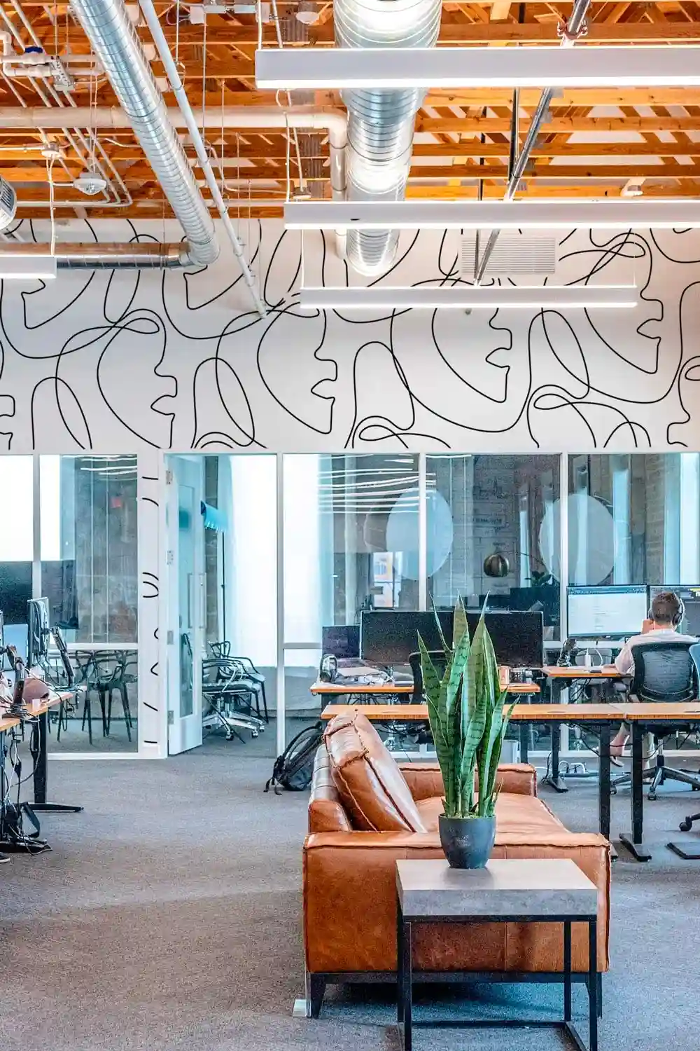 Commercial wallpaper installation enhancing a modern office interior in Downtown San Antonio